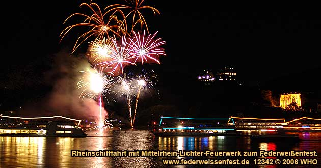 Firework display round boat trip Rhine river lights ™r in Octobe with DJ music and dance to the golden wine autumn and swimming Federweisser vintage festival on the Middle Rhine River in Germany.