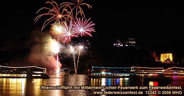 Firework display round boat trip Rhine river lights r in Octobe with DJ music and dance to the golden wine autumn and swimming Federweisser vintage festival on the Middle Rhine River in Germany.