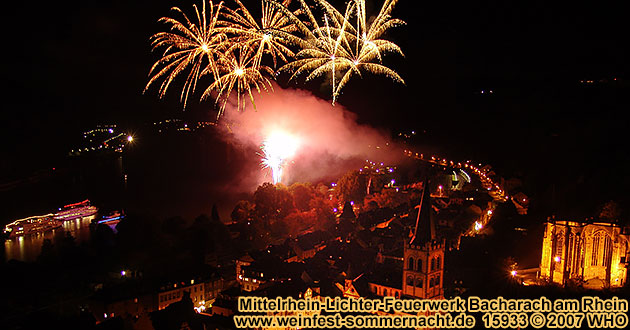 Firework display round boat trip Rhine River Lights, Wine festival summer night in Bacharach, Germany. 